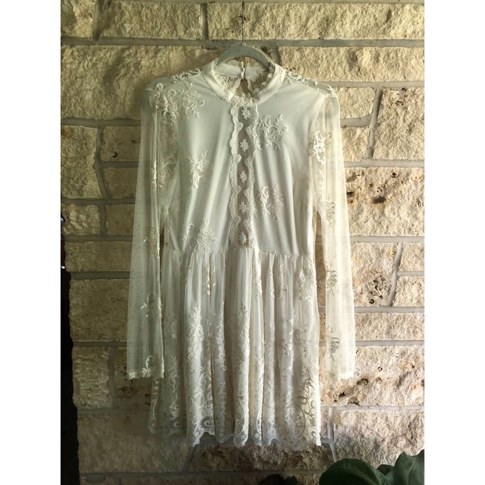 White long sleeve embroidered dress